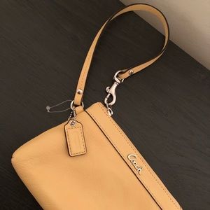 Coach yellow wristlet -New without tags